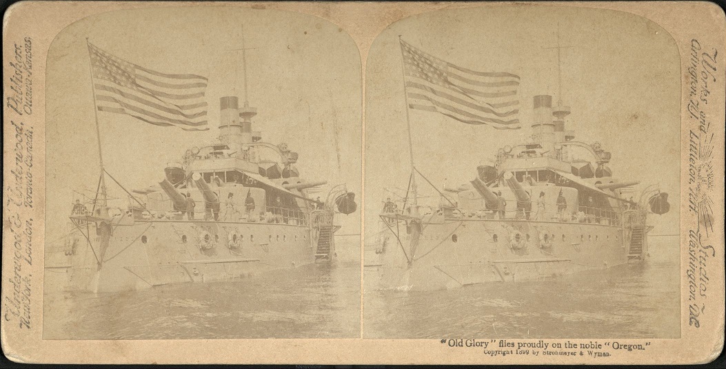 “Old Glory” flies proudly on the noble “Oregon.”